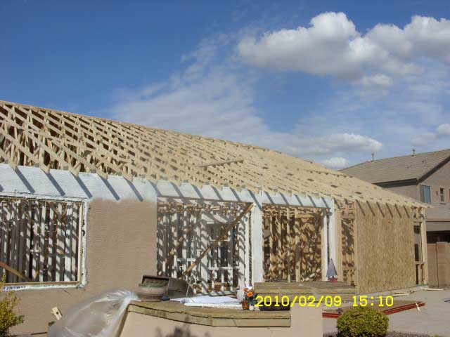 New roof framing during residential fire rebuild