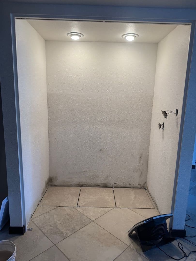 Wet bar with visible water damage before Kowalski restoration